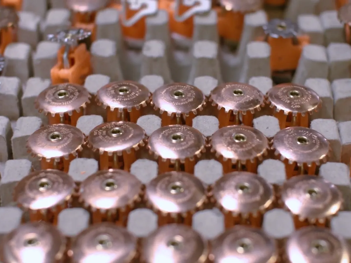 Sprinkler heads on a shop bench at Mack Fire Protection